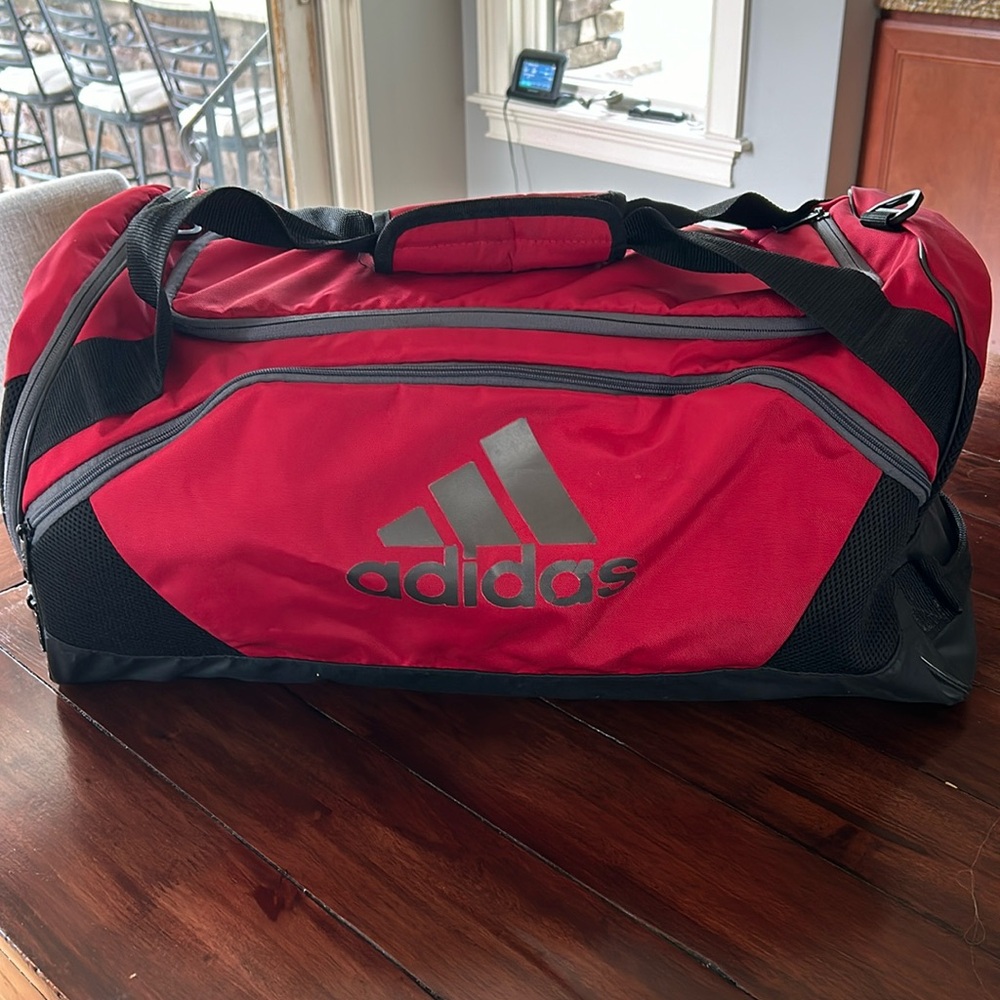 Adidas medium size basketball bag or duffle bag.